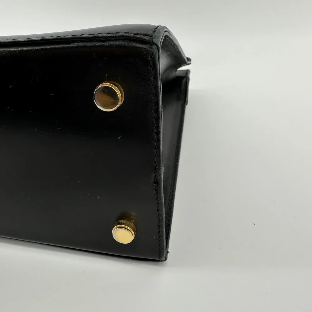 Salvatore Ferragamo Vintage Vara Ribbon Top Handle Bag Black Calfskin AQ-214178